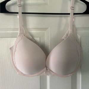 Victorias Secret Elegant Lace Trimmed Bra in light cream color padded